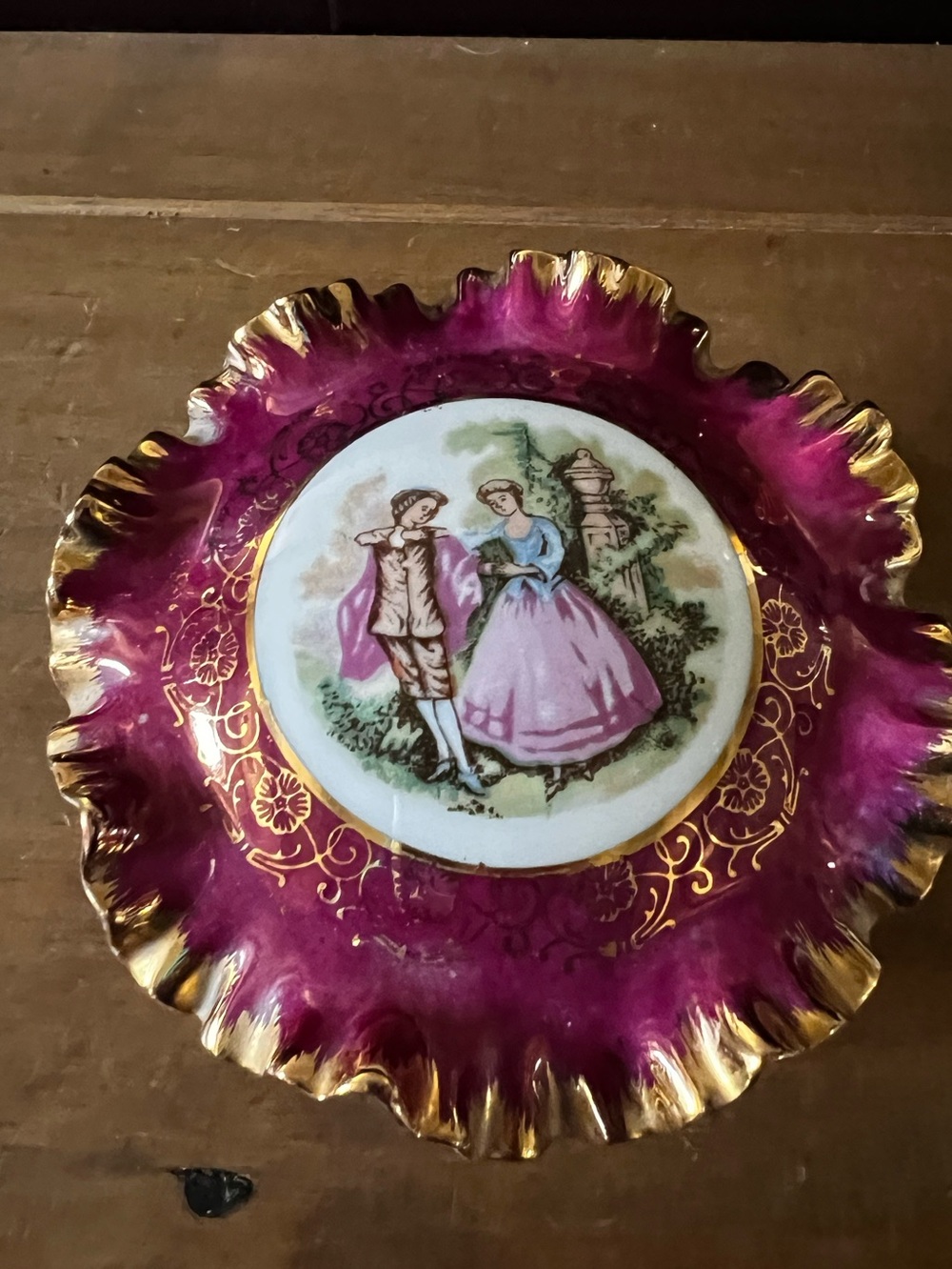 Gorgeous trinket dish. Made in Japan. No chips or cracks. Ruffled gold edges..